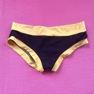 Black and yellow scrunch butt pole shorts
